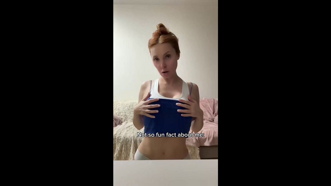 Sultry Mature Woman Teases with Big Tits in Solo Play